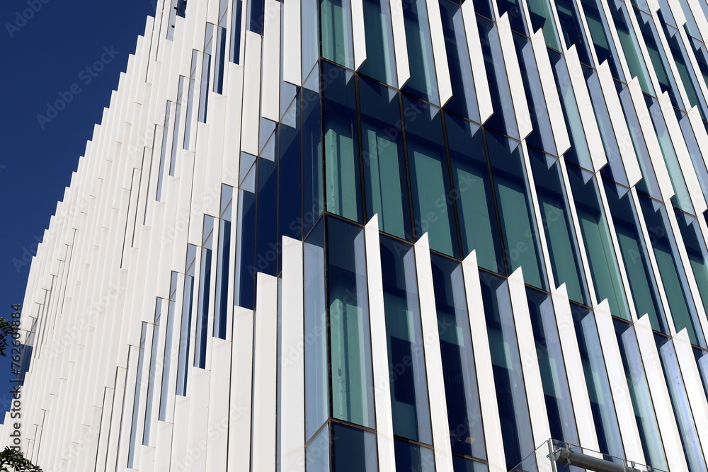 Modern appearance of high-rise buildings and structures made of glass and concrete. Modern appearance of high-rise buildings and structures made of glass and concrete.