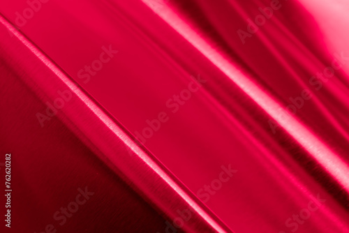 red bent metal sheet with visible texture. background