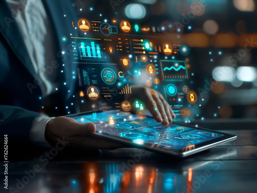Business executive using a touchscreen tablet with advanced holographic analytics interface, representing high-tech data management and futuristic computing