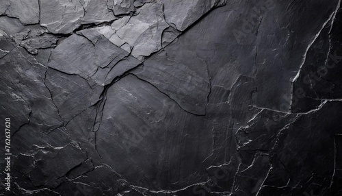 black grunge background texture of cracked stone surface black rock grunge background with copy space for your design photo