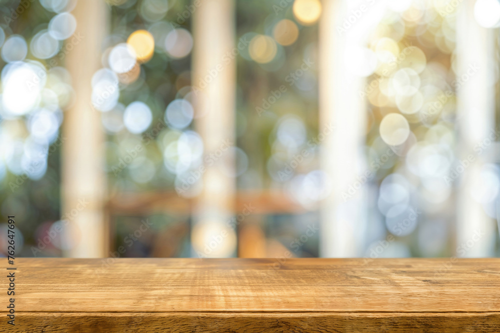 Empty wooden table with blurred bokeh lights in the background. Background concept with copy space for product display montage. High quality photo Empty wooden table with blurred bokeh lights in the background. Background concept with copy space for product display montage. High quality photo