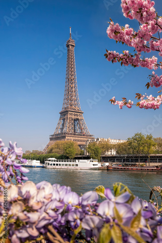 Eiffel Tower with boat during spring time in Paris, France