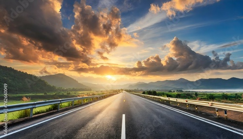 Asphalt road highway and blue sky with cloud at sunrise travel consept 