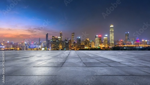 Concrete floor with cityscape and skyline background © Marko