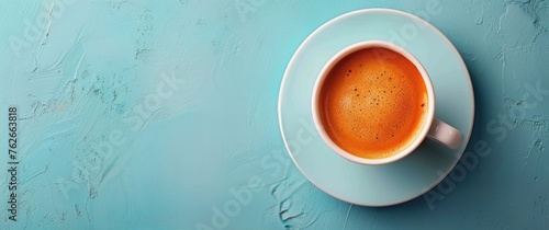A Cup of Coffee on Blue Table photo
