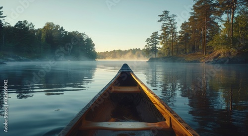 Canoe on Lake With Trees