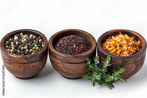 Set of spices and condiments in small bowls photo