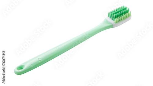 A vibrant green and white toothbrush rests elegantly on a pure white background