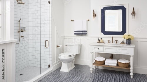 Guest bathroom with white shiplap and navy blue octagonal mosaic floor.