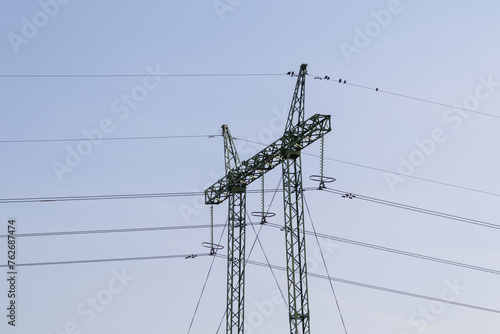 High voltage metal electric pole with wires © Armands photography