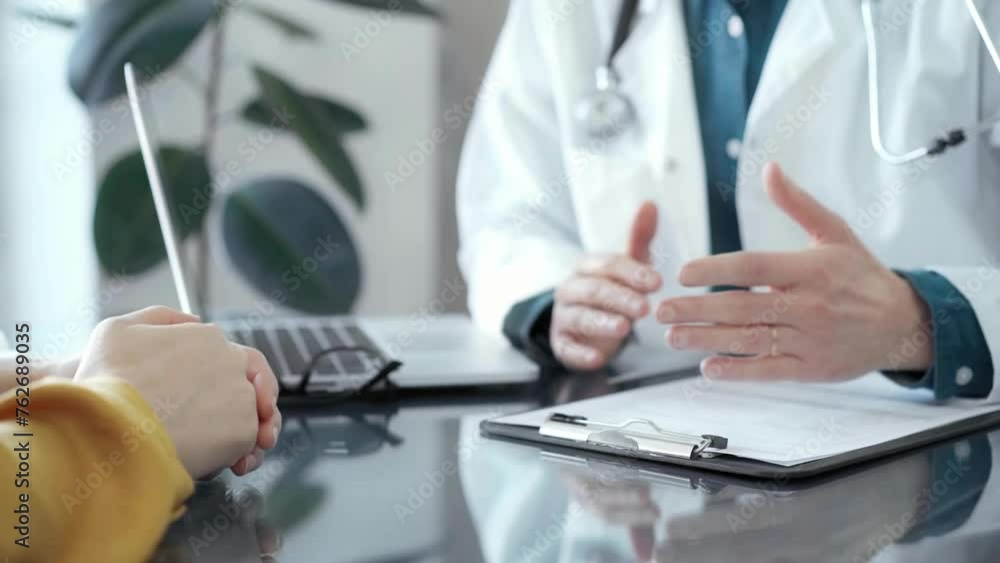 Doctor and patient consultation in clinic. Medicine and health care Doctor and patient consultation in clinic. Medicine and health care