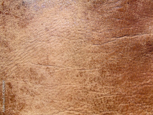 Texture of light brown aged leather close-up