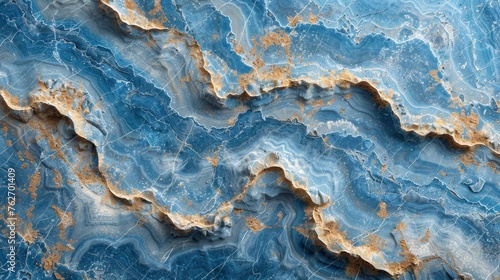  Close-up of blue, gold, white marble with wavy patterns