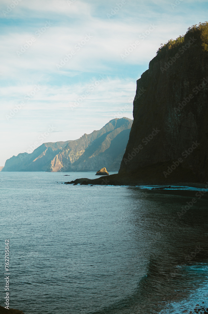 The ocean, the rocky shore of the island Madeira Island