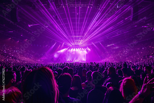 Arena or Stadium concert with center stage illuminated © Daniel