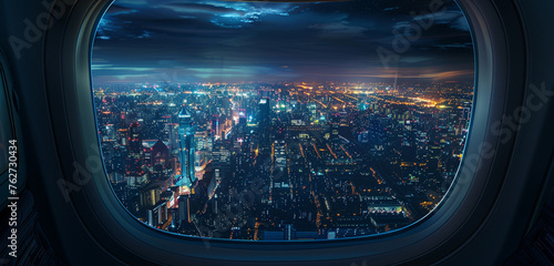 Night descends, and cityscapes create a surreal mosaic through the curved airplane window.