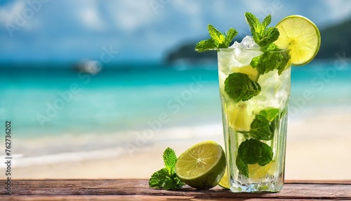 exotic mojito drink on blurred tropical beach background fresh mojito cocktail on blurred tropical beach