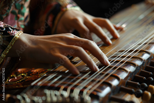 A close-up of a musicians hands playing an instrument