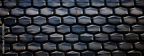 A black and white photo of a roof with a pattern of squares