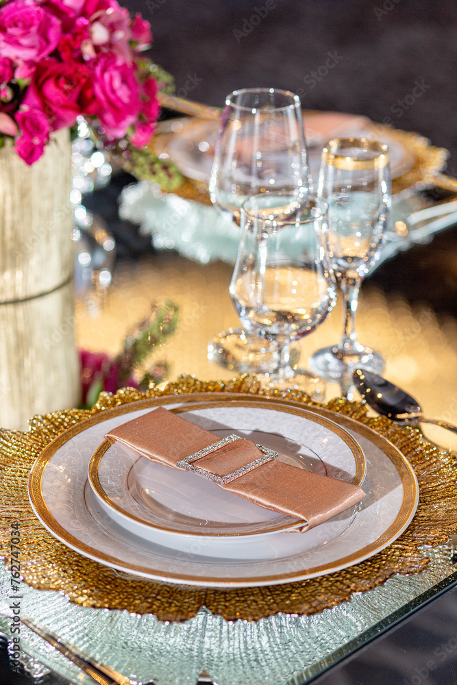 Elegant event table setting gold white magenta red