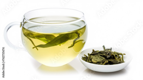 Cup with green tea and green leaves on white background