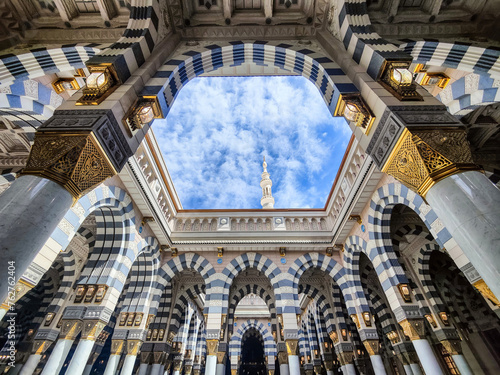 Courtyard of the Al Haram or Al-Masjid an-Nabawi mosque in Medina Saudi Arabia on a sunny day. It was the second mosque built by Muhammad in Medina and is now one of the largest mosques in the world.