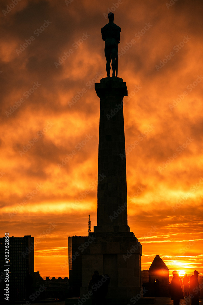 statue at sunset