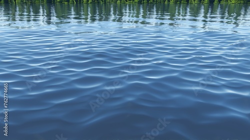 a body of water with ripples in the water and trees on the other side of the water and grass on the other side of the water.