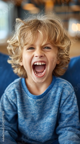 Funny toddler tantrum shouting with a very angry face