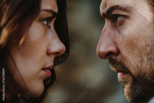 Two people, a man and a woman, face each other closely, with intense expressions suggesting a deep, emotional conversation or confrontation.
