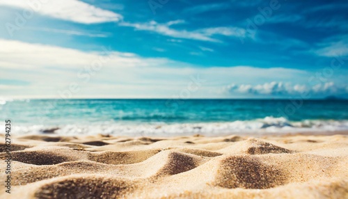 summer sandy beach with blur ocean on background