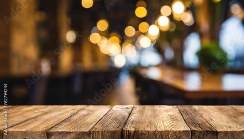 an empty tabletop podium in a restaurant with a blurred background with a copy of the evening bar space