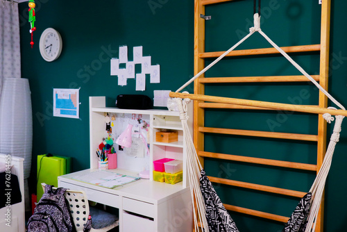 exercise ladder in coloured kids room in a bright day 