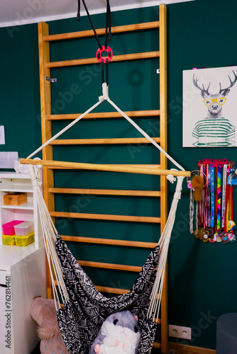 exercise ladder in coloured kids room in a bright day 