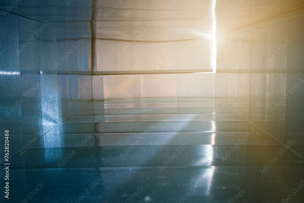 view inside the duct, large square section, blurred foreground and background with bokeh effect