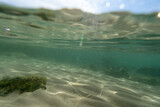 Split photography rock green underwater. High quality photo