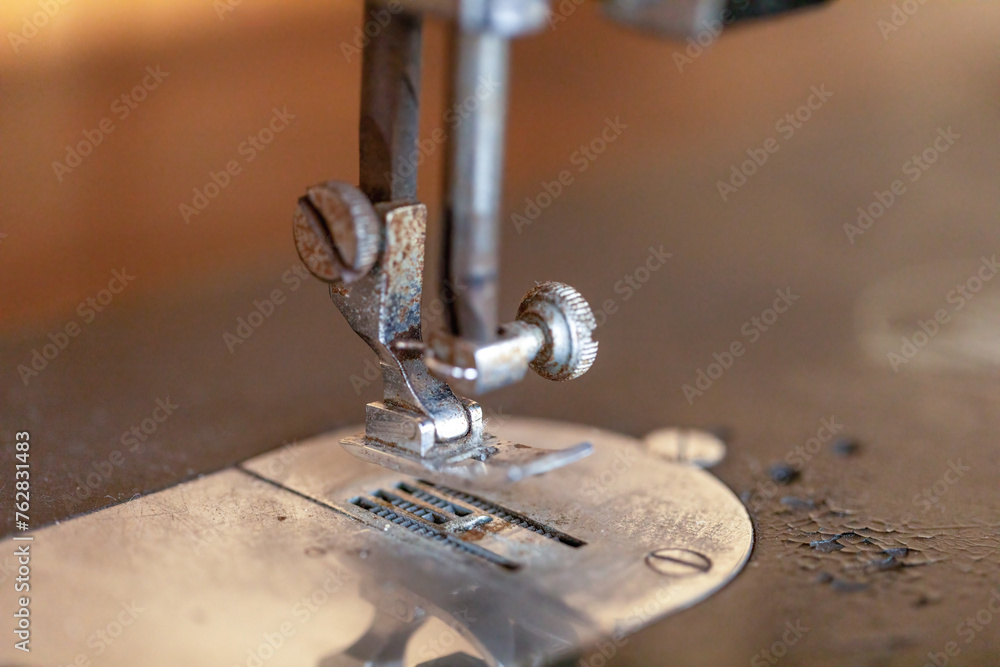 Detail close-up of an vintage sewing machine indoors