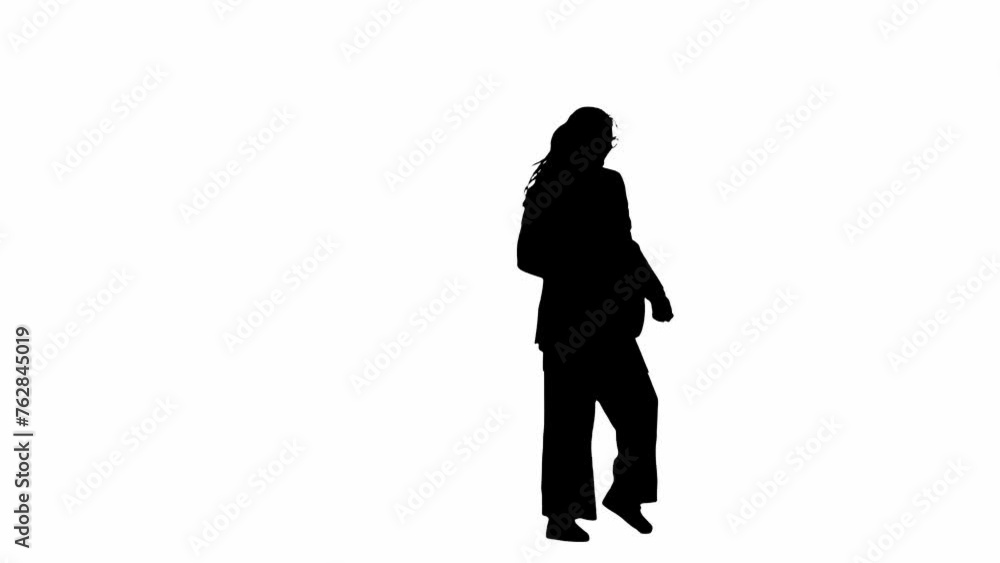 Business woman in formal outfit ending call on smartphone, jumps happily dances away. Black silhouette on a white isolated background. Business woman in formal outfit ending call on smartphone, jumps happily dances away. Black silhouette on a white isolated background.
