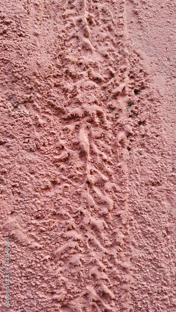 Textura de cimento em parede vermelha. Textura de cimento em parede vermelha.