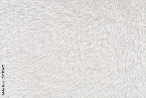 white plush fabric texture background, background pattern of soft warm material