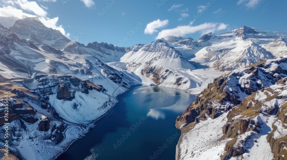 Obraz premium Aerial Panoramic View Of The Snowing Mountains Surrounding Laguna Del Inca In The Chilean Andes, Chile.