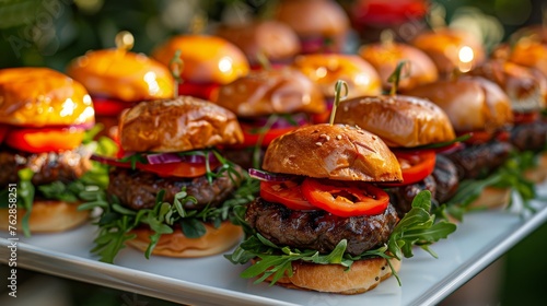 Gourmet slider hamburgers on platter for outdoor party celebrations