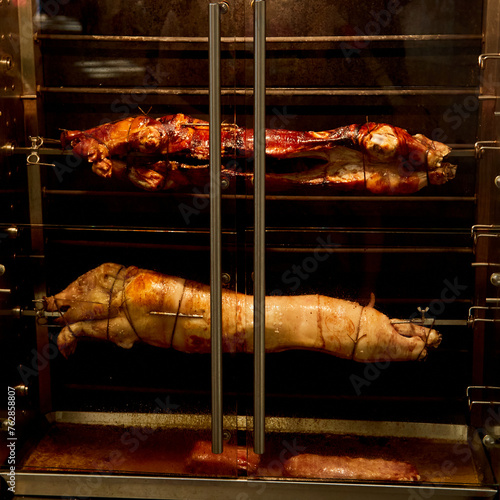 Roasting Suckling Pigs on Spit at a Parisian Market