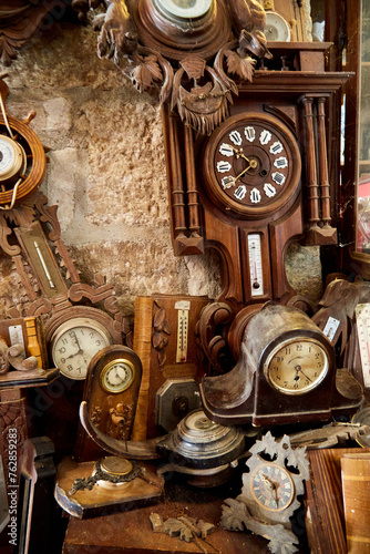Old Clocks on a Stone Wall