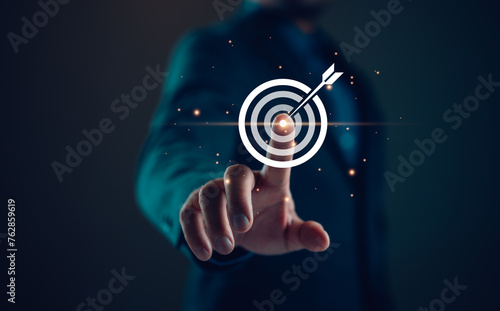 businessman holding target icon Business Growth and Vision, target Plans and Business Strategies and Competitive Advantage, Banking and Finance, Goal Achievement The path to success.
