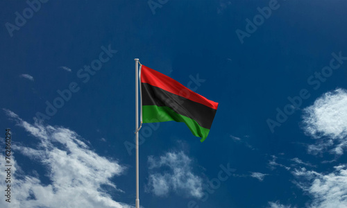 Junteenth 19 nineteen day june flag icon african american symbol blue sky cloudy white copy space patriotic equality united history racism emancipation human right jubilee federal heritage struggle 