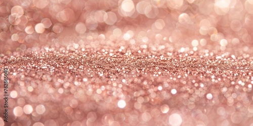 A mesmerizing background of shimmering rose gold glitter, sparkling with light and bokeh effects.
