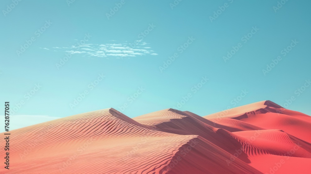 a pink sand dune with a light blue sky in the background