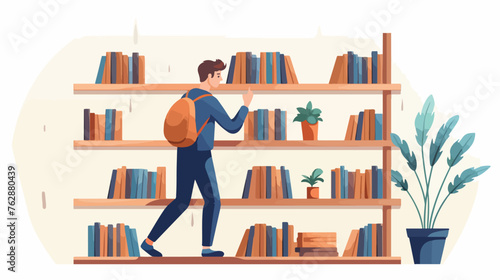 Young man taking picking a book from bookshelf shel