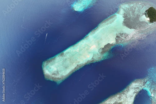 Принти на полотні Reefs and sandbar off Kri Island